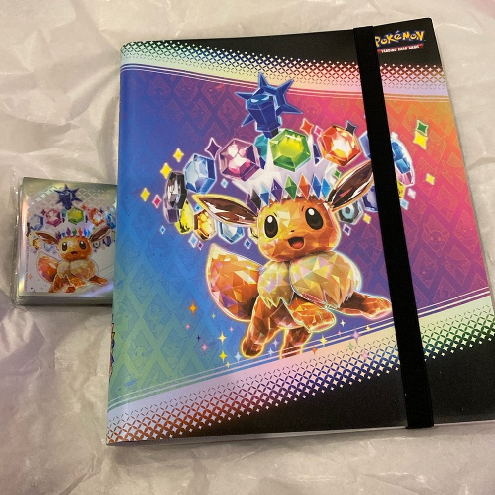 COPY - Pokémon Prismatic Evolutions Binder and Pack of sleeves
Brand new